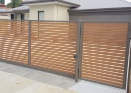 front house - brown fencing
