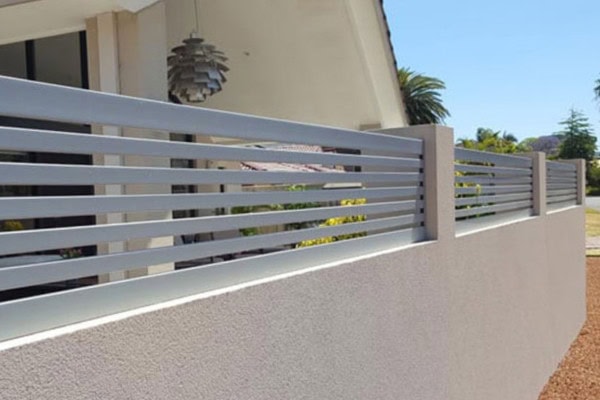 A photo of aluminium slat fencing.